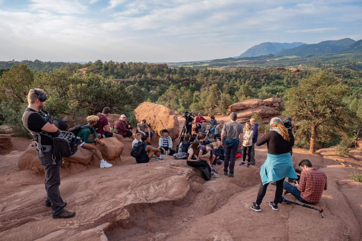 As part of the 2021 Summer Music Festival, Conductor Scott Yoo and a PBS film crew lead a group of music fellows on an early morning hike through the Garden of the Gods to shoot scenes for the PBS series "Now Hear This," directed and produced by Harry Lynch and hosted by Scott Yoo. Photo by Josh Birndorf ’20