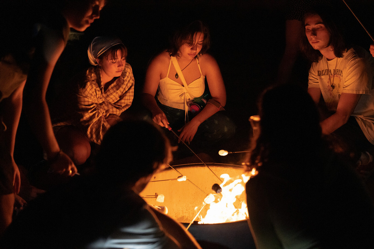 Students enjoying smores around a bonfire on a quick trip to Cheyenne Mountain State Park during NSO, organized by Outdoor Ed on Wednesday, 08/23/23. Photo by Mila Naumovska '26 / Colorado College.