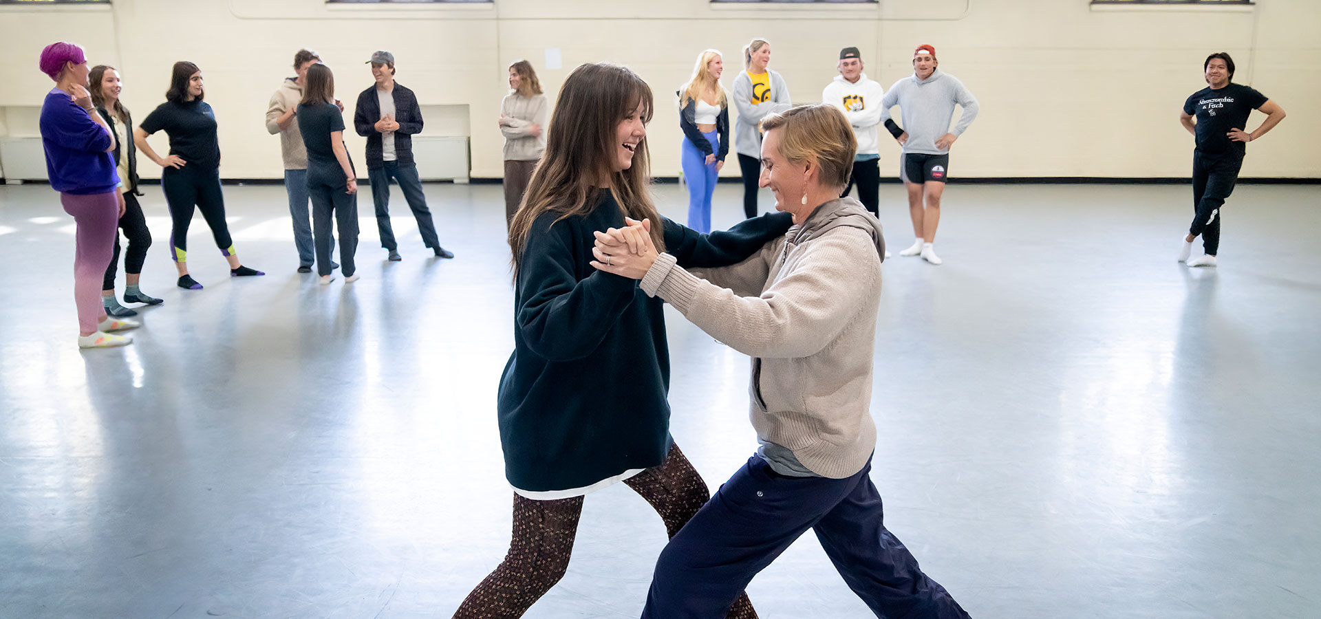 Rachel Boardman ’25 dances the waltz with Professor  during the Body in Motion class (), which includes sometimes dance, other times mind/body exercises, on Monday, April 18, 2022 at the Cossitt Gym. Photo by Lonnie Timmons III