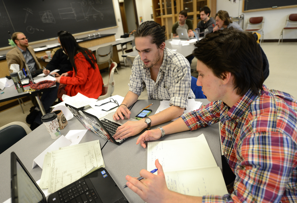 Physics students collaborating during an engineering class. <span class="cc-gallery-credit">[Kate Carlton]</span>
