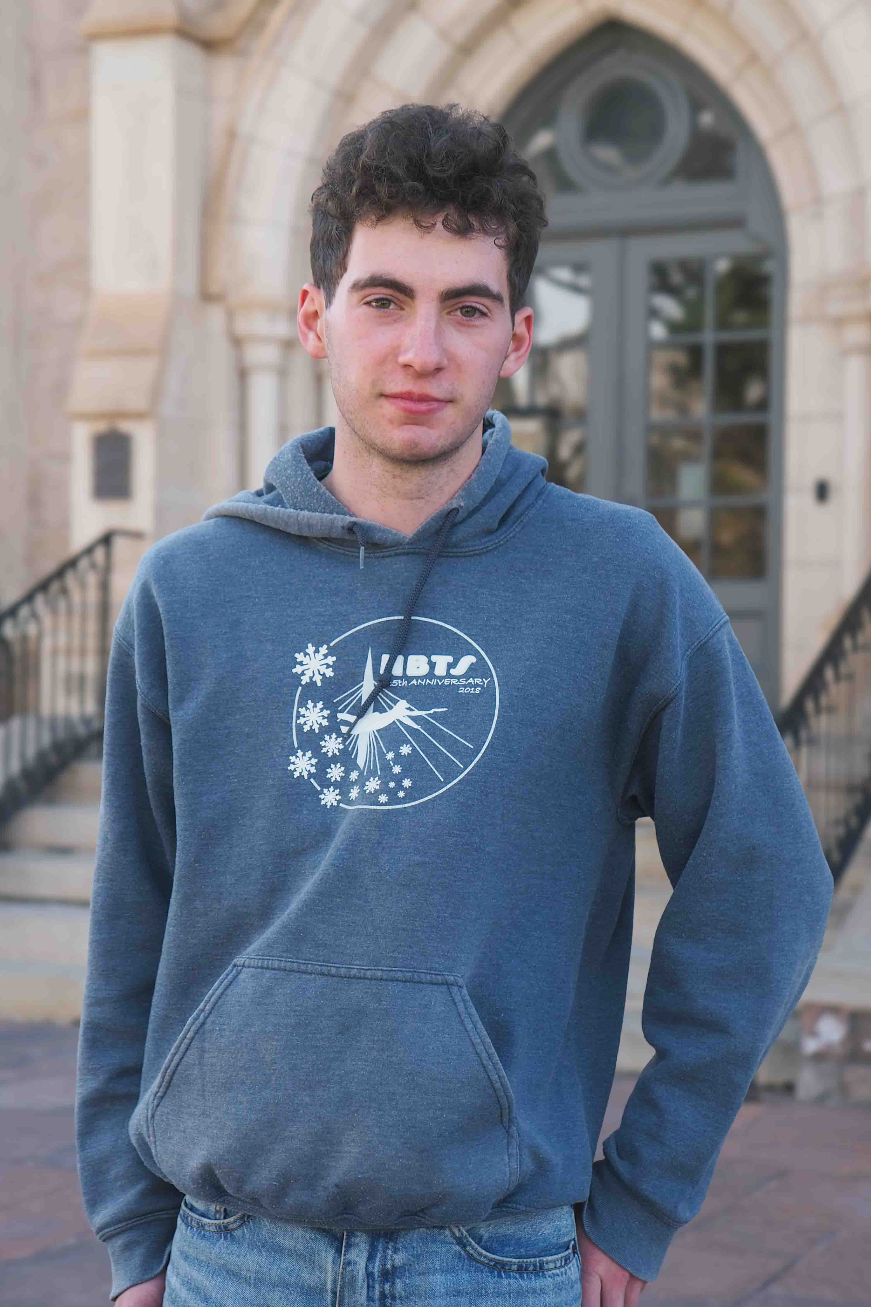 Ethan's headshot in front of Cutler Hall. 