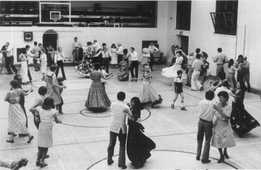 Square Dancers from many countries cover gym floor in Cossitt Hall, June 1980