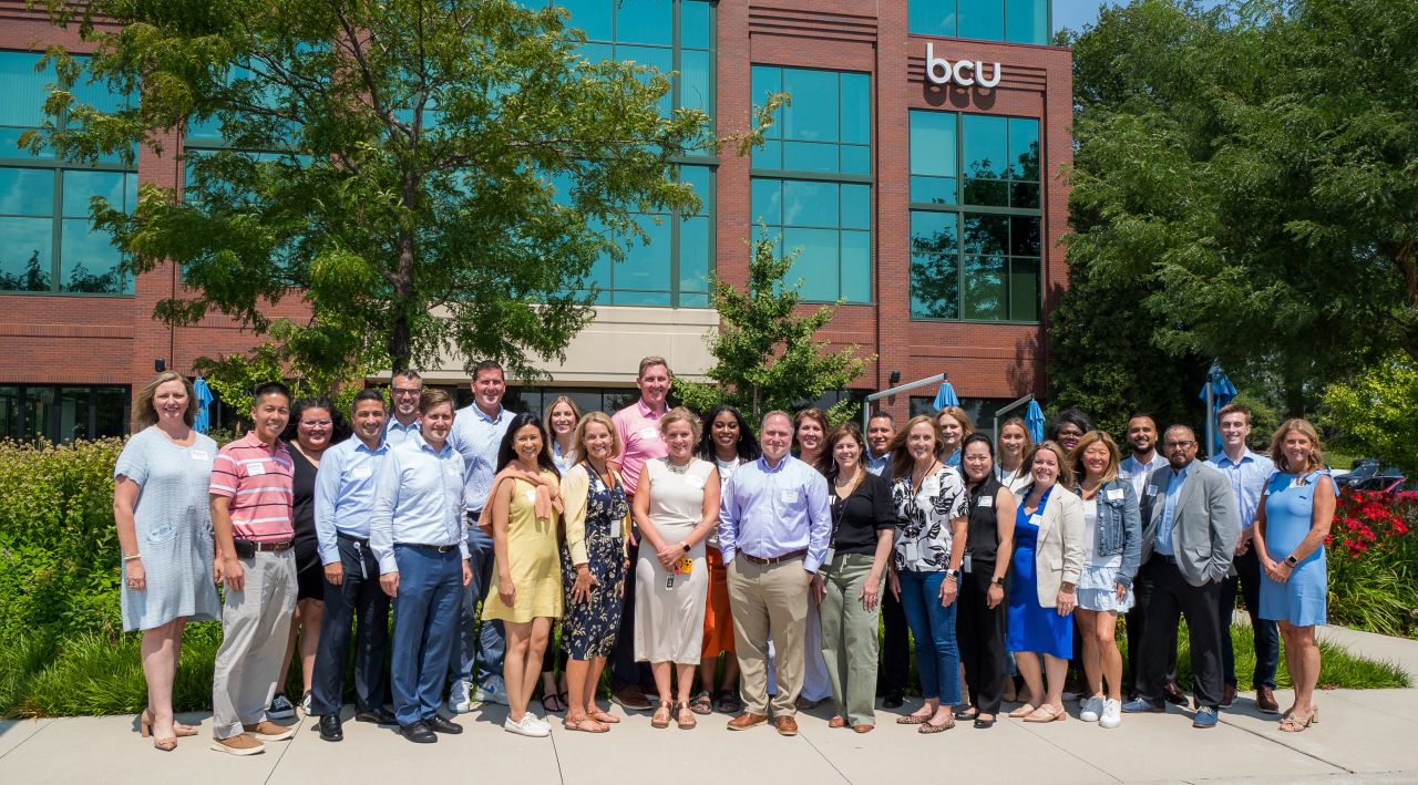 Business, Economics, and Society major Jack Saccaro ’26 spent the past summer interning at Baxter Credit Union (BCU) on the Business Development and Corporate Relations team. He is pictured during the Company Partner Round Table event, where representatives from company partners visited BCU headquarters for a week of in-depth discussion about BCU’s work and future goals.  Photo taken in Summer 2025 and provided by Saccaro.