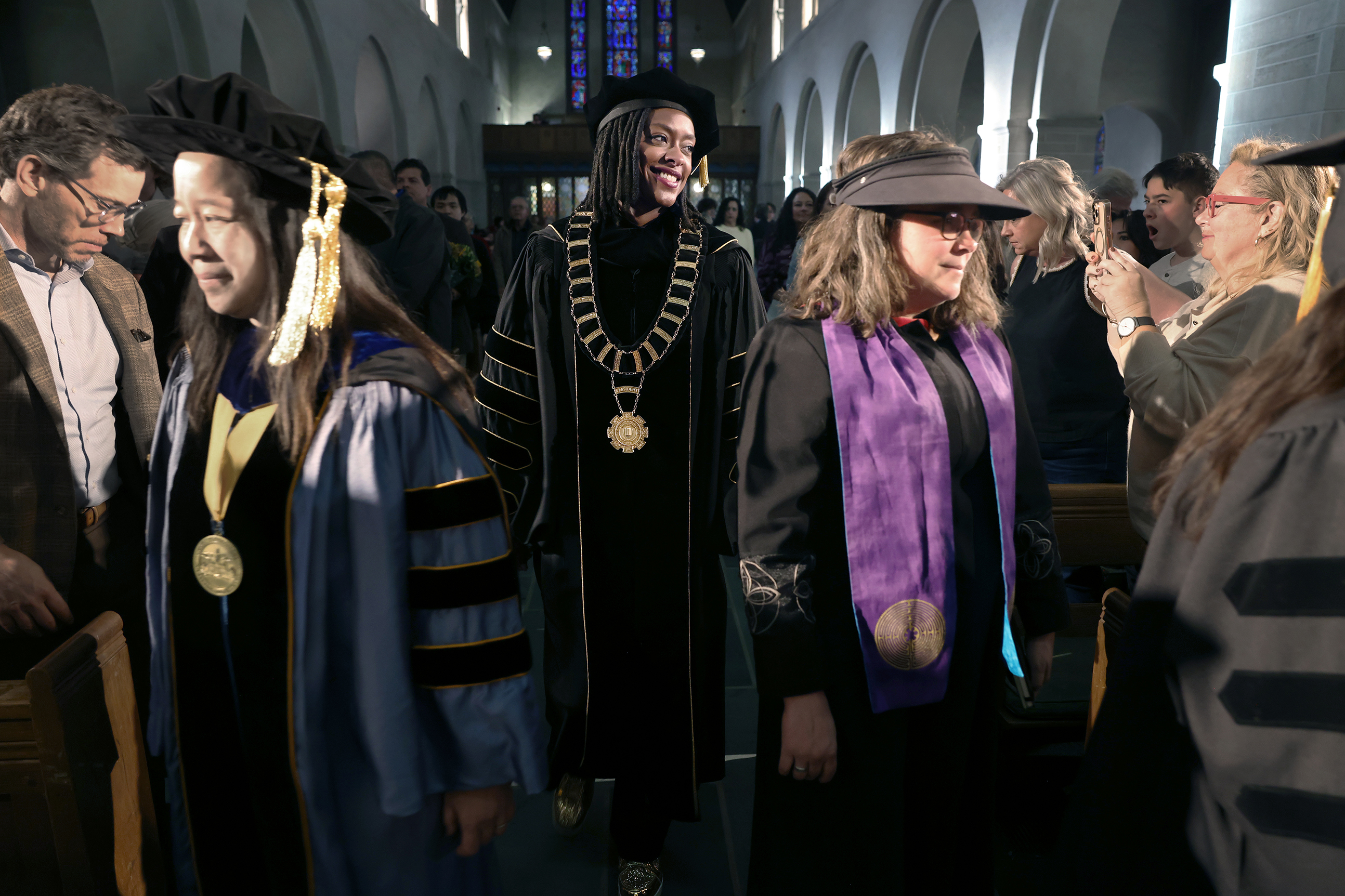 President Manya Whitaker, members of Cabinet, and faculty file into Shove Memorial Chapel to the traditional hymn of "Pomp and Circumstance" at the beginning of the ceremony. Photo by Jamie Cotten / Colorado College