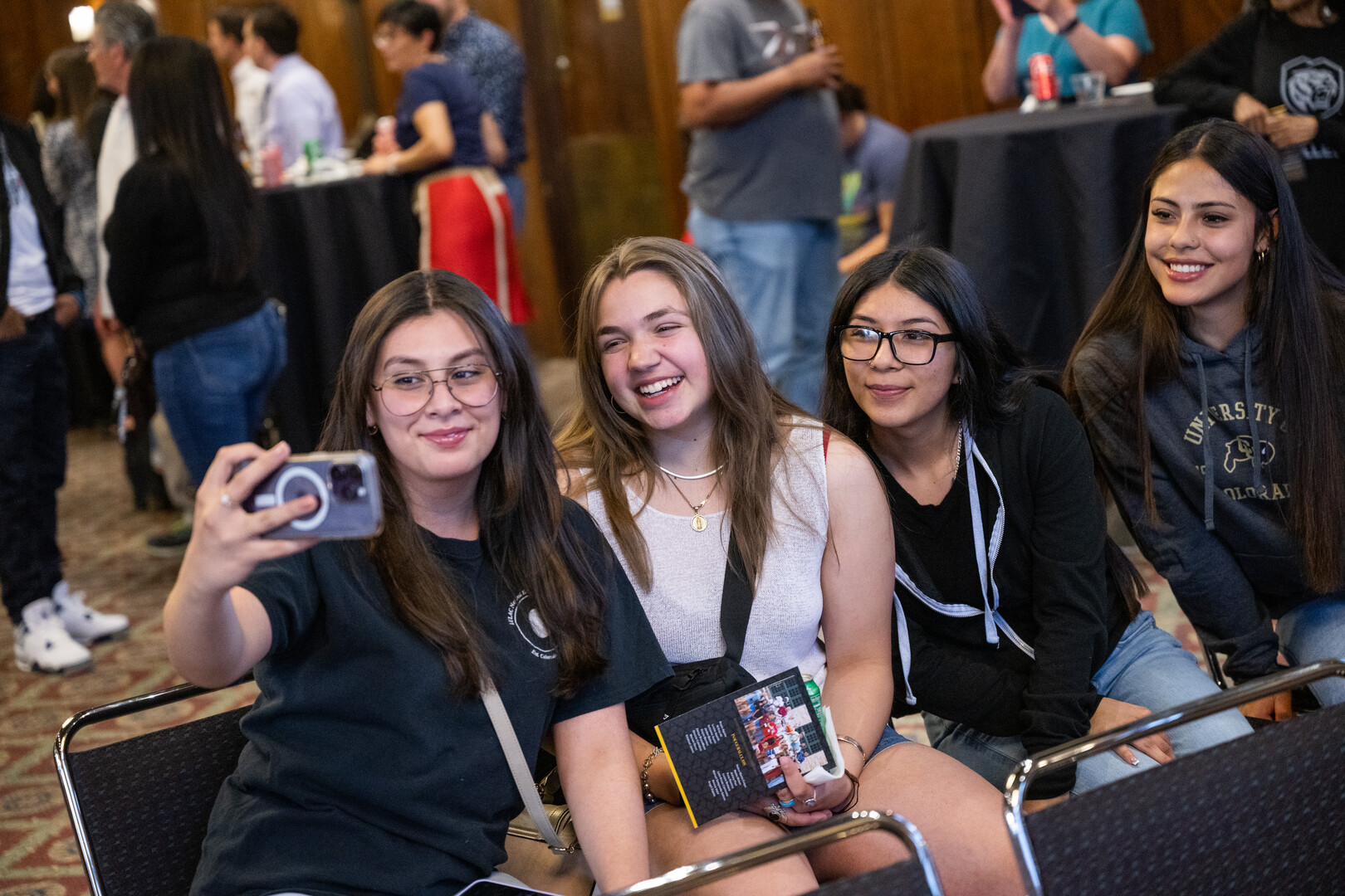 A group of students pose for a selfie at the College Signing Day event for the Stroud Scholars.  Photo by Lonnie Timmons III