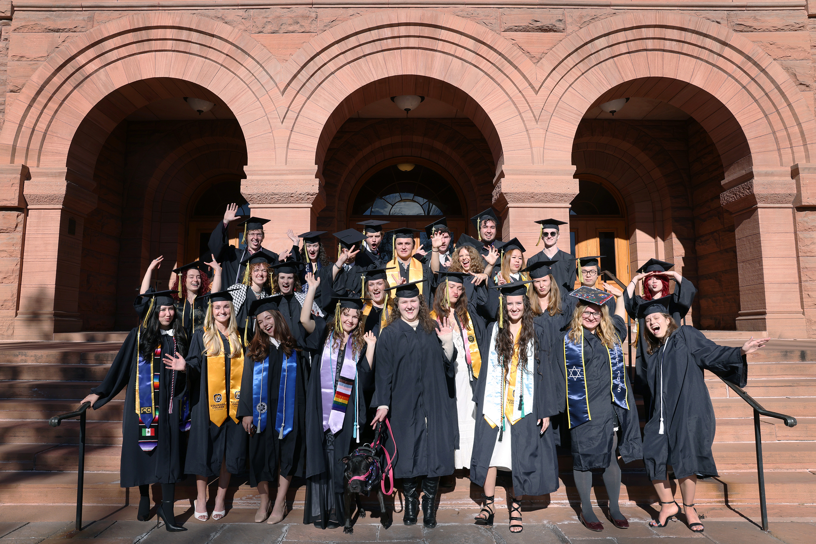 The Winter Commencement graduates of the Class of 2026 gather on the steps of Palmer Hall on CC's campus to pose for a group photo on December 14, 2025. Photo by Jamie Cotten / Colorado College