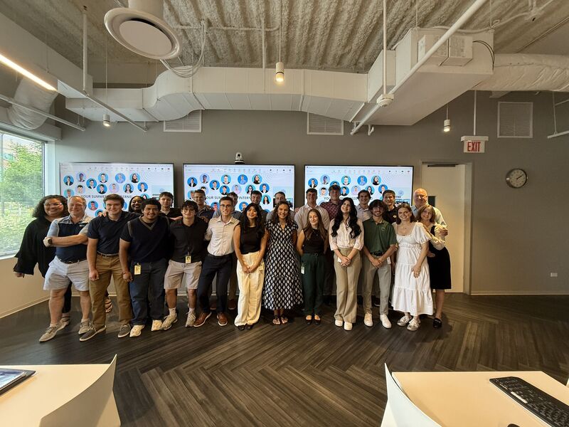 Jack Saccaro ’26 co-led the 2025 Intern Collaborative Project at Baxter Credit Union, where the interns designed a campaign targeting young professionals between 20 and 30 years old. All interns and several staff members are pictured in August 2025 after the interns delivered their final presentation. Photo provided by Saccaro.