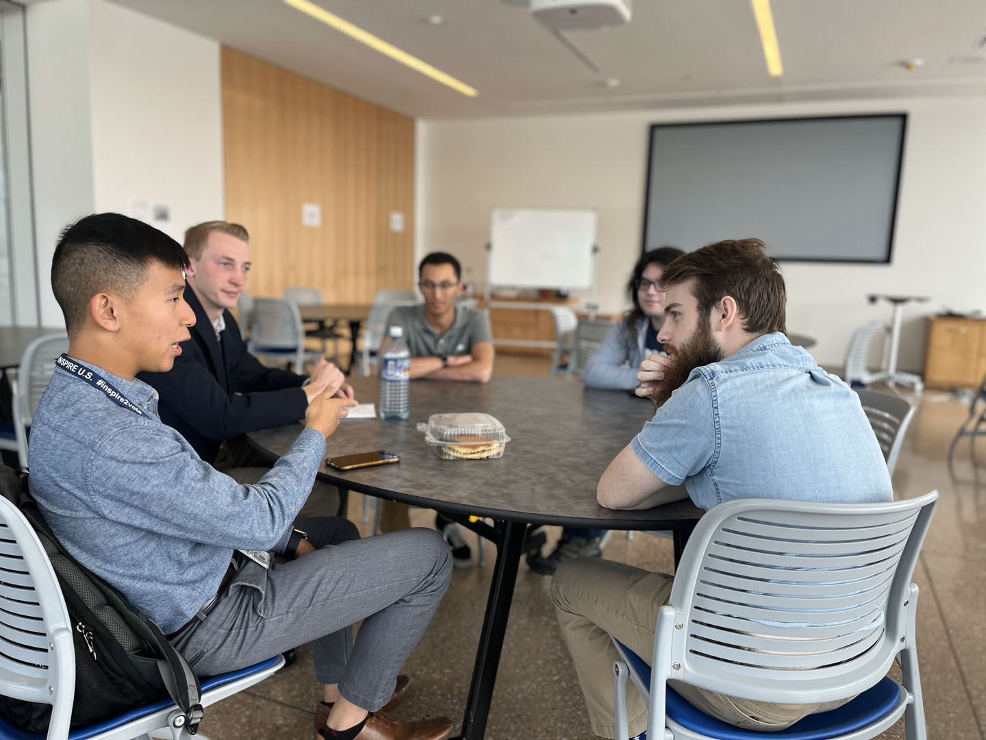Tom Byron '23 and Jay Byron '25 are pictured discussing U.S. relations with China with USAFA cadets at a DDP meeting on October 1, 2022, at the USAFA. Photo taken by USAFA cadet Ashay Stephen. 