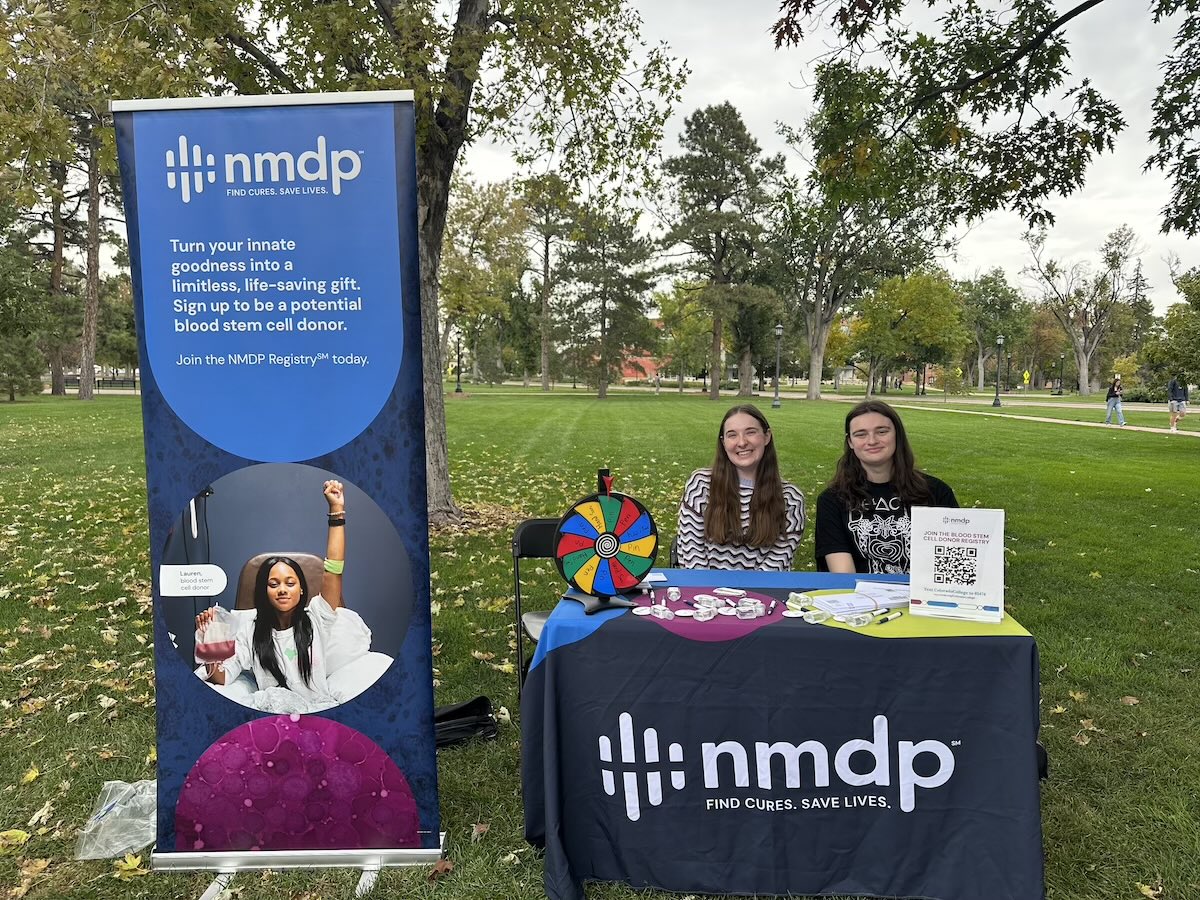 Iris Pixler ’28 and Katherine Rodbell ’28 help CC students join the NMDP Registry on campus in October 2025. Photo provided by Pixler.