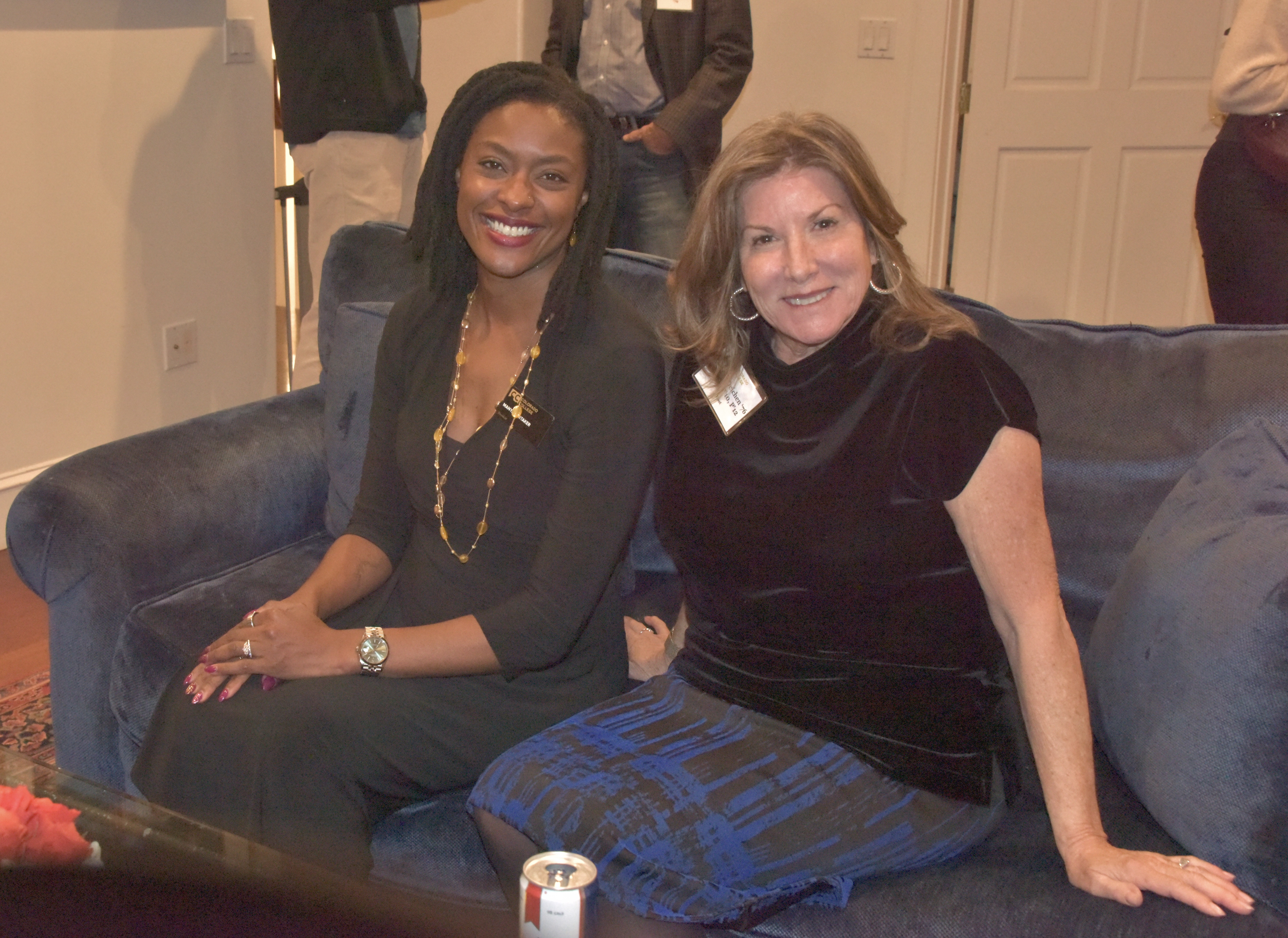 Manya poses with the event host.