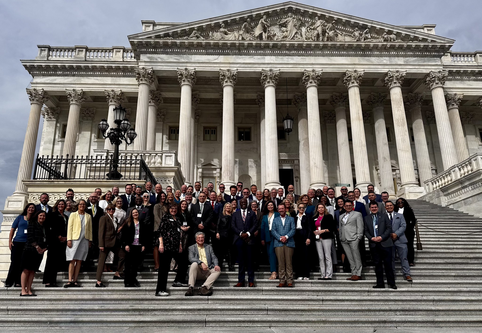 Manya poses with a group of Colorado Springs leaders on Capitol Hill.