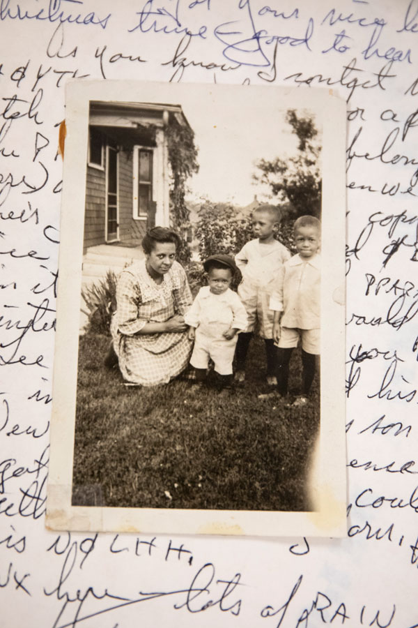Ellis Butler Jr. along with his mother and brothers