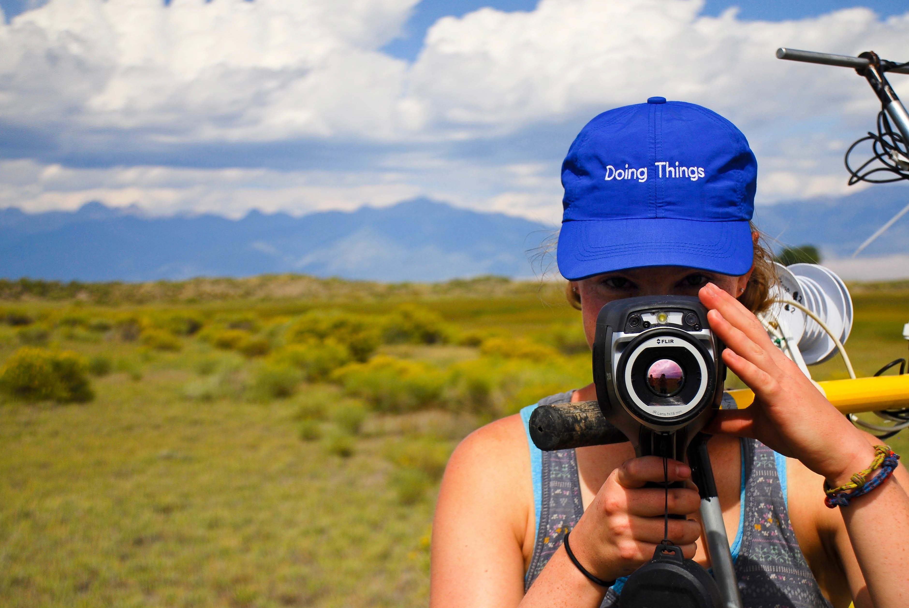 Student pointing camera